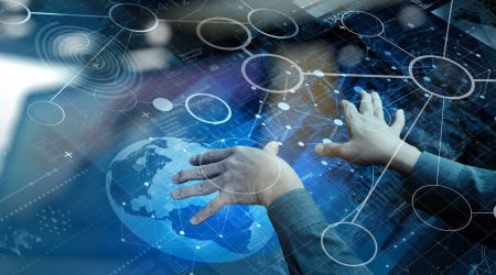 top view of businessman hand working with modern technology and digital layer effect as business strategy concept